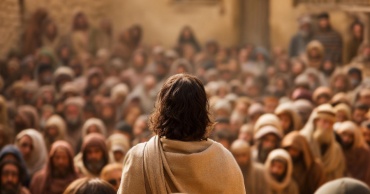 Predicazione di Gesù davanti a una folla che lo ascolta